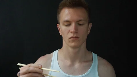 Man doesn't like sushi. Stock Footage 92153718