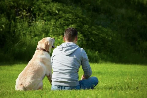 Man with dog Stock-Fotos