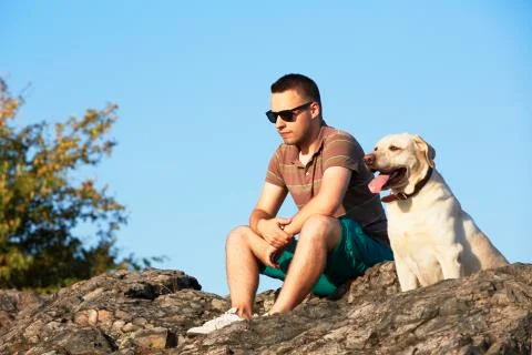 Man with dog Stock Photos