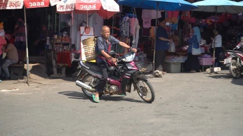 Man in Doi riding a motorcycle. Doi Pui Hmong Village Chiang Mai, Thailand. Stock Footage 123745819