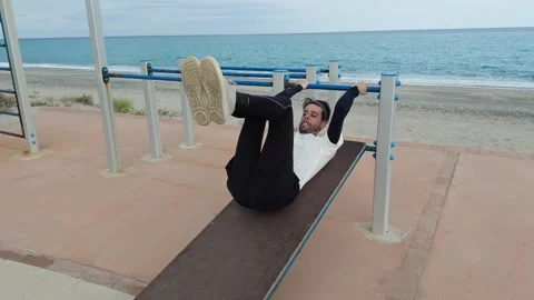 Man Doing Abdominal Exercises Outdoor Stock Footage 276309604