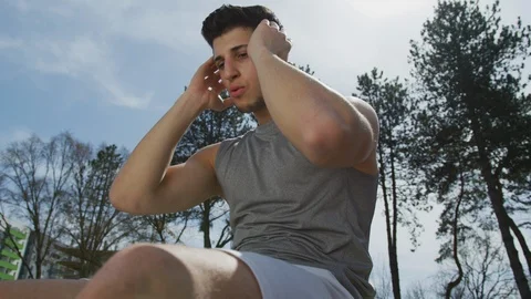Man doing abs exercise Stock Footage 100028891