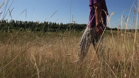 Man doing back flip in the field Stock Footage 158012214