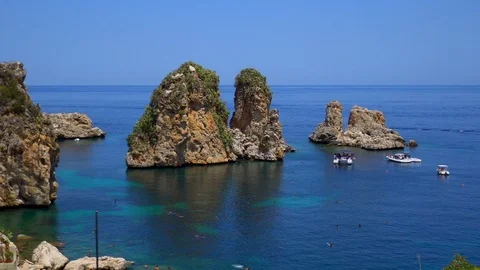 Man doing backflip cliff jumping from big rock in Scopello, Sicily, Italy. Stock Footage 91950512
