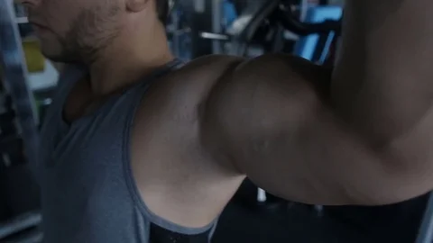 The man is doing the biceps exercise Stock Footage 83035472