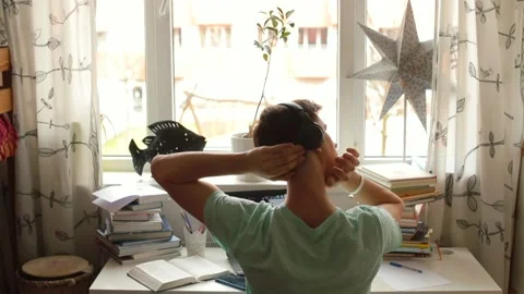 Man doing body workout sitting computer It improves body tone during teleworking Video stock 153242888