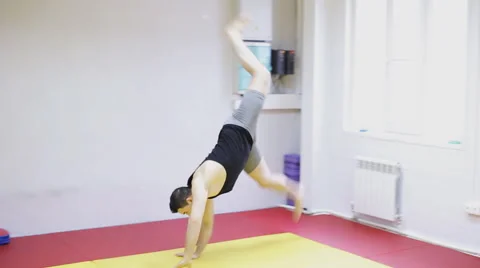 Man doing a Cartwheel Stock Footage 63431664