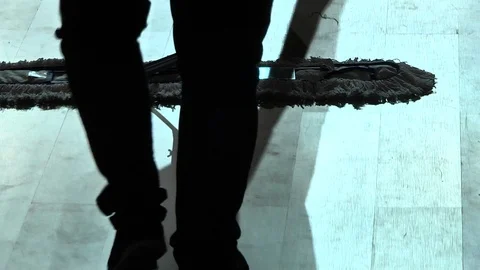 Man doing cleaning, wipe the floor with mop Stock Footage 88433247