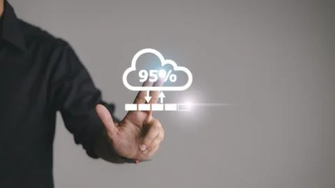 Man doing cloud uploading or downloading on laptop computer at office Stock Photos