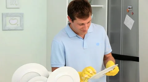 A man doing the dishes Stock Footage 1096779