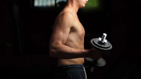 Man Doing Dumbbell Biceps Curl Stock Footage 133816907