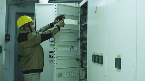 Man doing electrical metering equipment Video stock 68509435