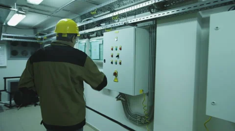 Man doing electrical metering equipment Video stock 68510008