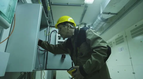 Man doing electrical metering equipment Video stock 68510266