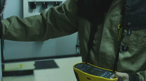 Man doing electrical metering equipment Video stock 68511347