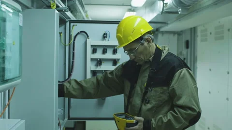 Man doing electrical metering equipment Video stock 68511562