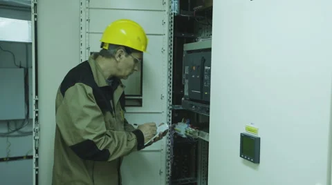 Man doing electrical metering equipment Video stock 68512339