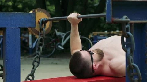 Man doing exercise with barbell Stock Footage 65259305