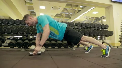 Man doing exercise with dumbbells Stock Footage 47859237