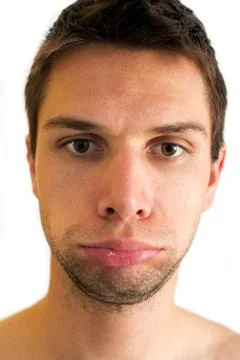 Man doing expression and blowing up lips Stock Photos