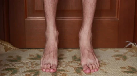 Man doing feet gymnastics 스톡 동영상 65370696