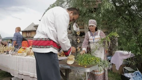 Man doing a figurine from a tree Stock Footage 82364189