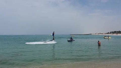 Man doing flyboarding in the water Stock Footage 149459847