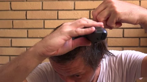 Man doing haircut by himself 스톡 동영상 138753811