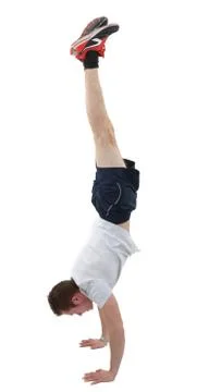 Man doing the handstand on white background Stock Photos