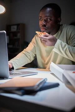 Man doing his overworked at office Stock Photos