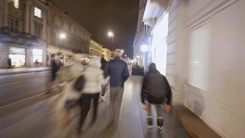 Man doing jump on inline skates at night in motion blur Stock Footage 120750110