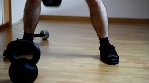 Man doing a kettlebel Stock Footage 20521550