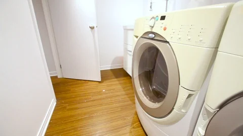 Man doing laundry Stock Footage 100694969