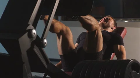 Man doing leg press at the gym Stock Footage 62174010