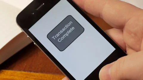 Man doing mobile banking on smartphone Stock Footage 31747338