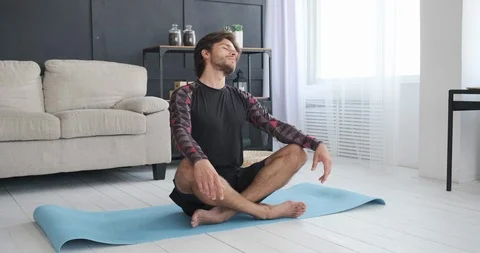 Man doing neck rotation exercise Stock Footage 117701936