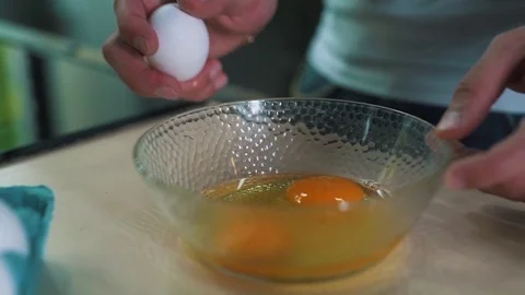 The man is doing omelette Stock Footage 79107210