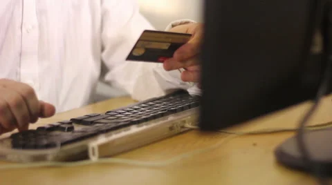 A man doing online transaction on the computer. Stock Footage 58810251