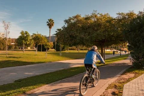 Man doing outdoor exercise in Turia Park Stock Photos