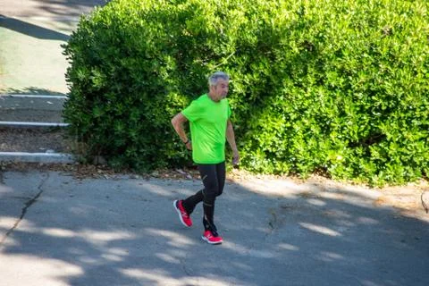Man doing physical activity at the park Stock Photos