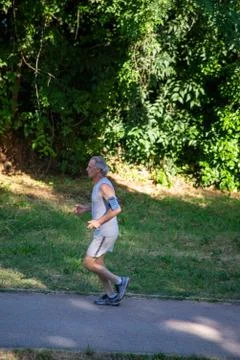Man doing physical activity at the park Stock Photos