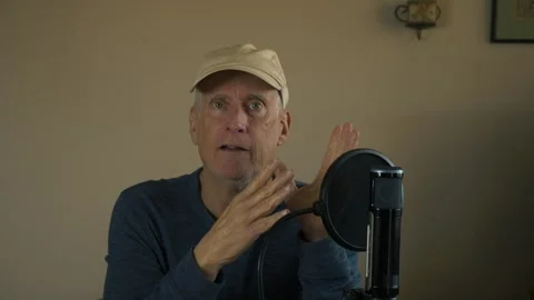 A man doing a podcast from his home Stock Footage 270092768