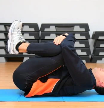 Man doing postural exercises Stock Photos