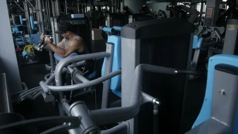 Man is doing preacher curl Stock Footage 85615428