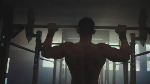 Man doing pull-ups exercise Stock Footage 236181816