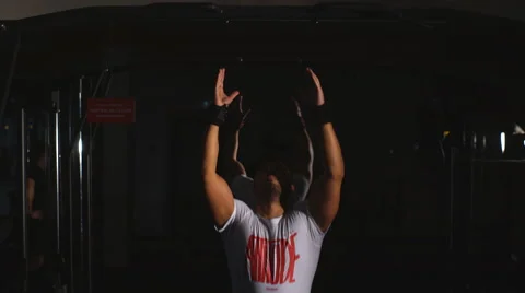 Man doing pull UPS Stock Footage 62219856