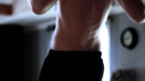 Man doing pull-ups Stock Footage 84792931