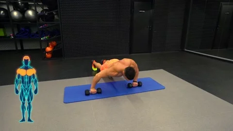 Man doing push-ups with dumbbells in the gym Stock Footage 211652603