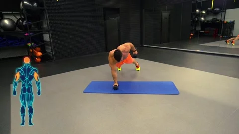 Man doing push-ups with dumbbells in the gym Stock Footage 211654289
