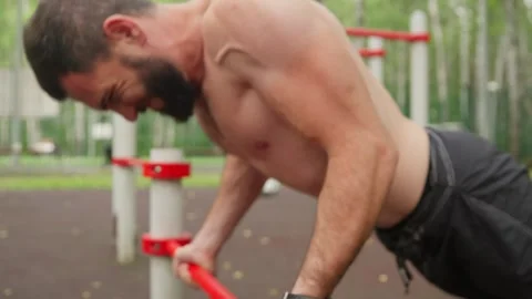 Man Doing Push-ups at Outdoor Gym 스톡 동영상 329599166